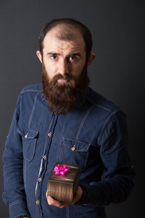 male model shoots in studio environmentの写真素材
