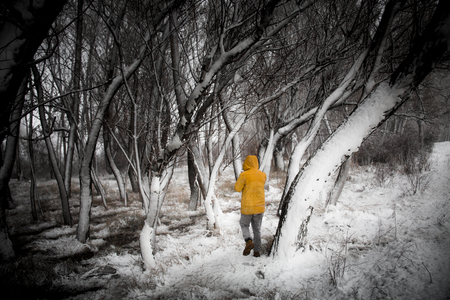 the man who is in the road that is snowの写真素材