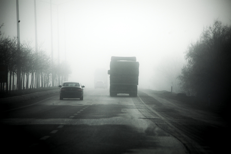 Foggy traffic view in winterの写真素材