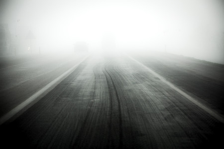 Foggy traffic view in winterの写真素材