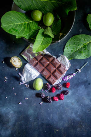 Compositions of green walnut on special dark ground
