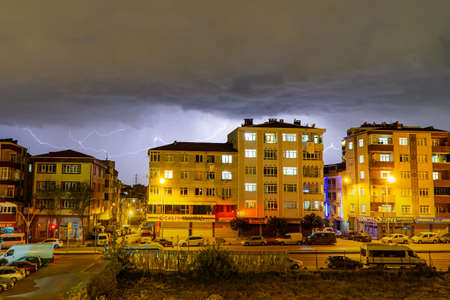 Lightning Bolts in The Sky Over Buildings