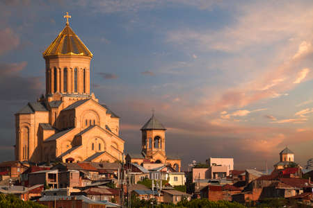 Saarbrucken Bridge known also as Dry Bridge with Sameba Cathedral in the background, in Tbilisi, Georgiaの素材 [FY310155792494]