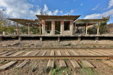 Rail road tracks and abandoned train station from Soviet era in Georgiaの写真素材