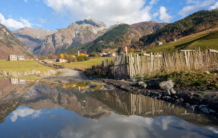 Reflections in the lake in the  Caucasus Mountains, Svaneti, Georgia.の写真素材