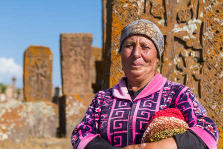 Armenian woman in the historical cemetery of Noraduz in Armenia.のeditorial素材