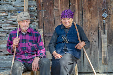 Elderly Georgian couple in the Caucasus Mountains, in Ushguli, Georgia.