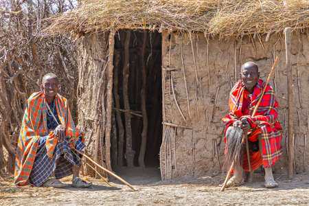 Maasai men in the village near Ngorongoro Crater, in Ngorongoro, Tanzaniaのeditorial素材