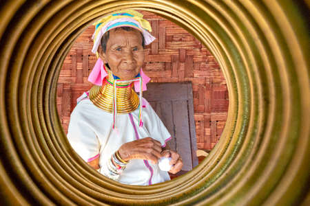Elderly tribal long neck woman through neck rings, in Inle Lake, Myanmar