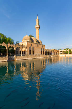 Sacred pond with carps in it known as Balikligol in Sanliurfa, Turkey. It is believed that Prophet Abraham was thrown into the fire in this spot.のeditorial素材