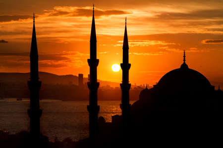 Blue Mosque in silhouette at the sunrise, Istanbul, Turkey.の写真素材
