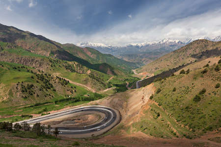 Winding roads and mountains between Tashkent and Fergana Valley in Uzbekistanの写真素材