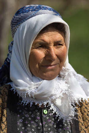 Elderly Turkish woman in traditional dress in the countryside of Konya, Turkeyのeditorial素材