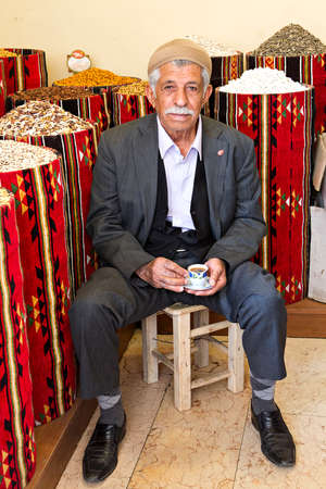 Elderly local man with his coffee in hand, in Mardin, Turkey.のeditorial素材