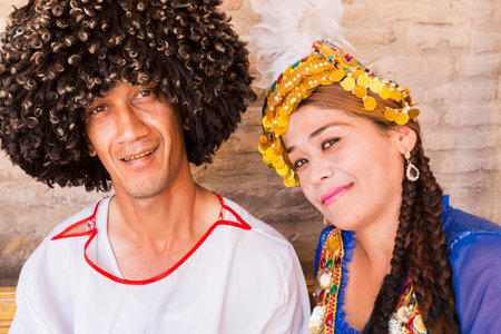 Couple from the Khorezm region of Uzbekistan in traditional dresses.のeditorial素材