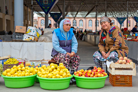 Uzbek ladies selling fruits in the fruit and vegetables market known as Siab Bazaar, in Samarkand, Uzbekistanのeditorial素材