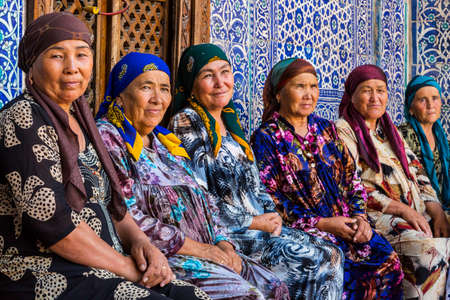 Uzbek women in colorful dresses in Khiva, Uzbekistanのeditorial素材
