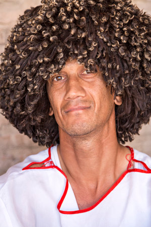 Man wearing traditional local hat known as Tilpak in Khiva, Uzbekistan.のeditorial素材
