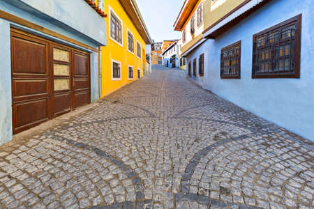 Colorful houses on a cobblestone street, in the town of Buldan in Turkey.の写真素材