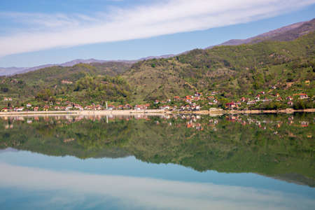 Village houses and reflections in Bosnia and Herzegovina