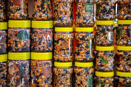 Dried fruits in jars in the market in Kyrgyzstanの写真素材