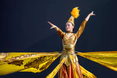Kyrgyz dancer performing during preparations for the Independence Day which is a national feast, in Ala Too Square, Bishkek, Kyrgyzstanのeditorial素材