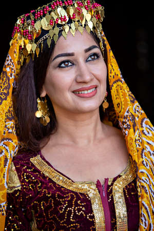 Portrait of Uzbek woman in traditional clothes in Khiva, Uzbekistanのeditorial素材
