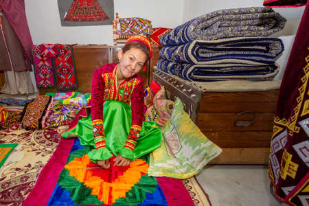 Uzbek woman making traditional local blanket in Nukus, Uzbekistanのeditorial素材
