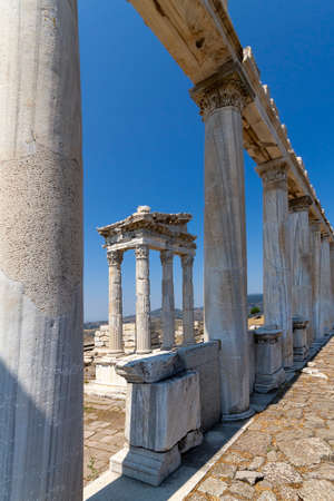Columns of the Roman Temple of Trajan in the ruins of the ancient city of Pergamum known also as Pergamon, Turkey.のeditorial素材