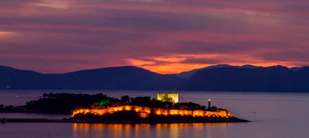 View over the Pigeon Island at night known also as Kusadasi on the Aegean Sea, Kusadasi, Turkey