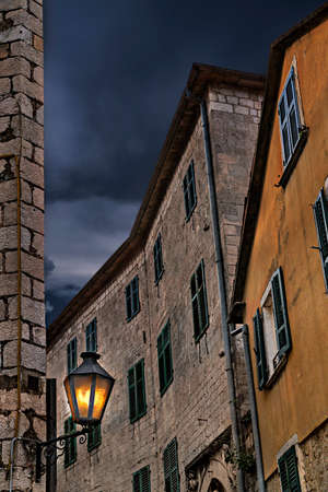 Old houses and street light in the old town Kotor, Montenegroの写真素材
