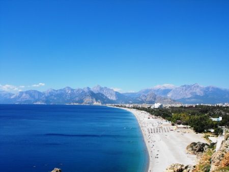 The big beach in Antaliya.In the bottom Taurus mountains.の写真素材