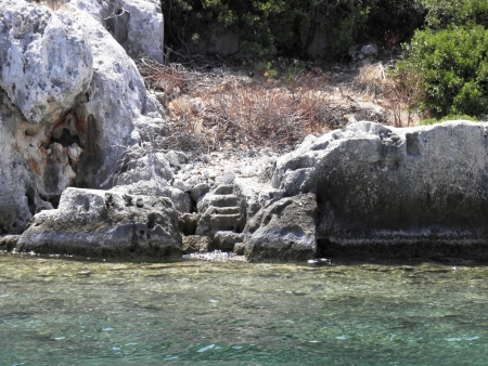 Steep stone steps leading to the residential area remained under sea level due an earthquake in the Gulf of Kekova の写真素材