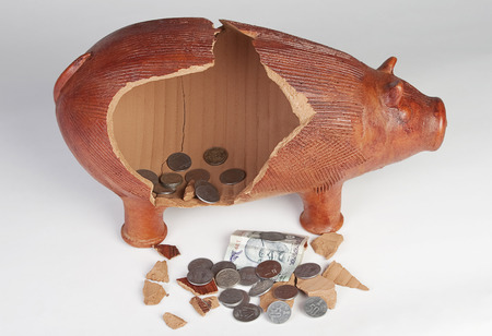 Broken piggy bankの写真素材