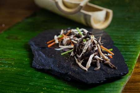 A stone plate of mushroomの写真素材