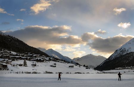 sunset on the snow,Livignoの写真素材