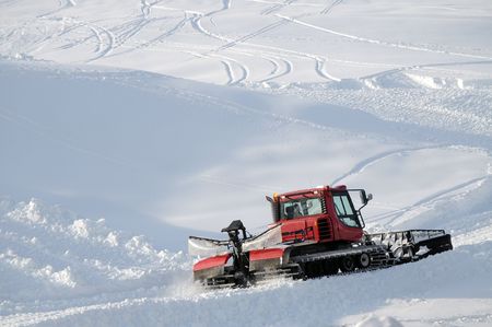 a snow cat at workの写真素材