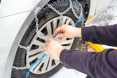 install snow chains on car