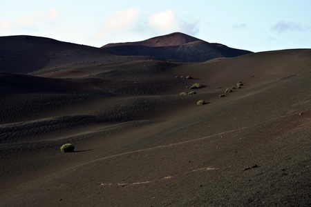 volcanic landscape in national park Timanfaya in Lanzarote, Spainの写真素材