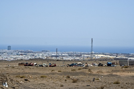 pollution by garbage and old rusty car near Arrecife