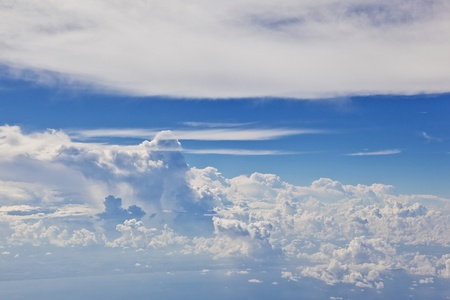 puffy white cloud blue skyの写真素材