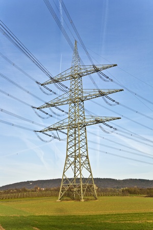 electrical tower in beautiful landscape with skyの写真素材