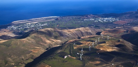 aerial of Lanzarote with wind power plants on volcanoの写真素材