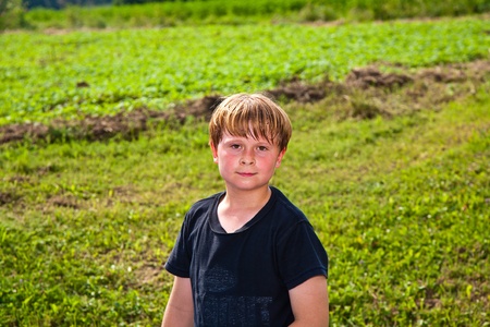 sweating boy after sport looks confidentの写真素材