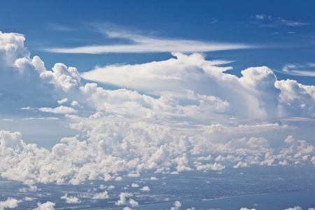puffy white cloud blue sky