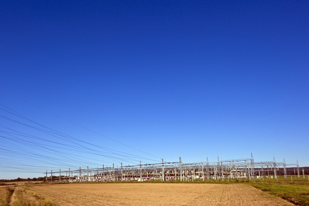 electrical power plant in beautiful colorful meadow