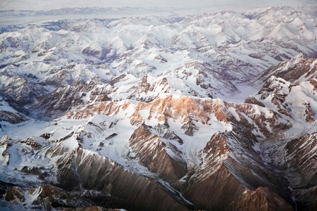 beautiful view from the aircraft to the mountains in Tashkent, china and Kirgistan, covered with snowの写真素材