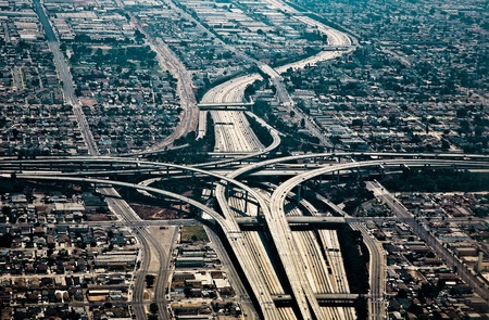 landing at Los Angeles Airport with view to streets and huge crosing of freeway