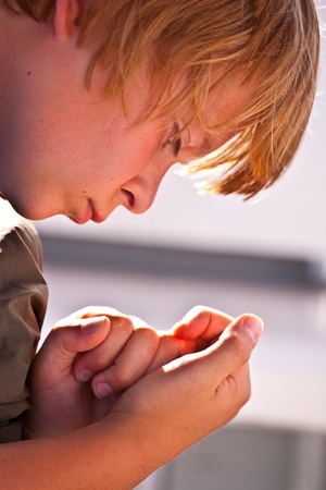 boy looks positive and smilesの写真素材