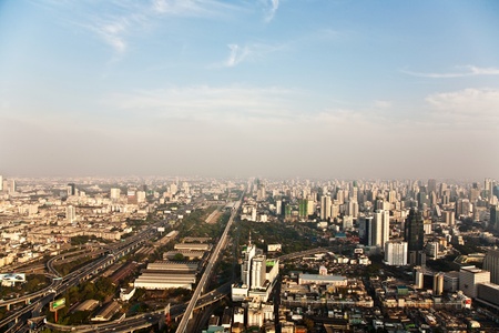 View across Bangkok skyline showing office blocks and condominiums